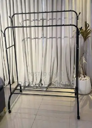 Double Pole Clothing Rack with Wheels & Lower Shelf