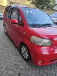 Toyota Porte 1.3 FWD 2009 Nyekundu - 5