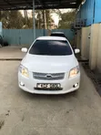 Toyota Axio 1.5 X 4WD 2009 Nyeupe - 1