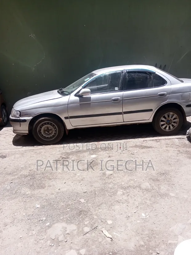 Nissan Sunny 2012 Silver - 1