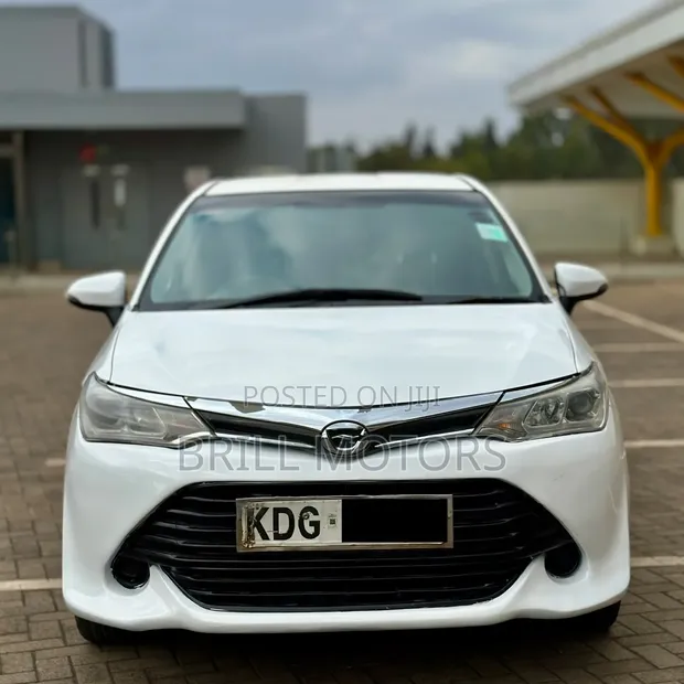 Toyota Corolla Fielder 2014 Nyeupe - 1