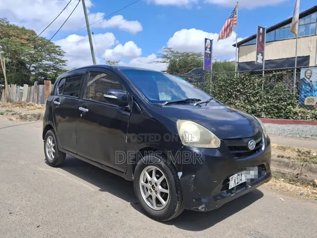 Daihatsu Mira 2014 Nyeusi - 1