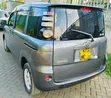 Toyota Sienta 1.5 AWD 2008 Gray Minivan - 2