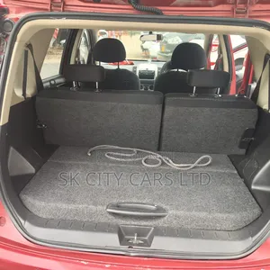 Nissan Note 2010 Nyekundu