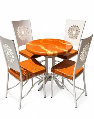 Set of 4 Brown Chairs and 1 White Table