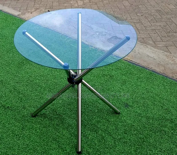 Round Glass-Top Dining Table with Crossed Metal Legs - 1