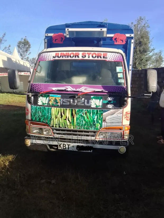 Isuzu ELF Lori 2015 - Nyeupe - 1