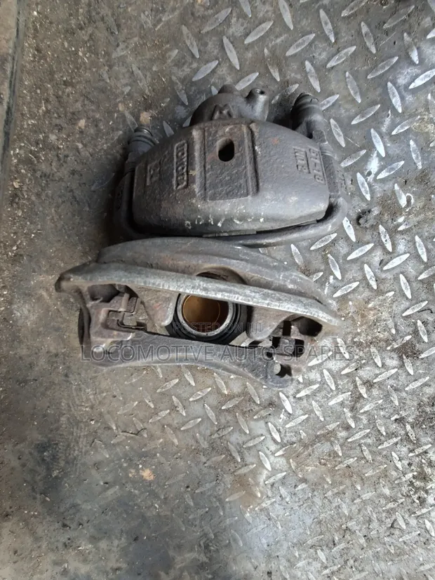 Front Brake Caliper ya Toyota Corolla Spacio (91) - 1