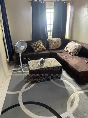 Living Room Set: L-Shaped Sofa, Ottoman, Carpet, Curtains & Heater