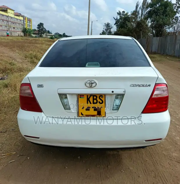 Toyota Corolla 2005 Nyeupe - 1
