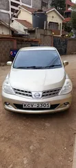 Nissan Tiida 2012 Beige - 1