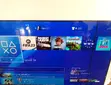 PS4 Console with 2 Controllers & FIFA 23 - 5