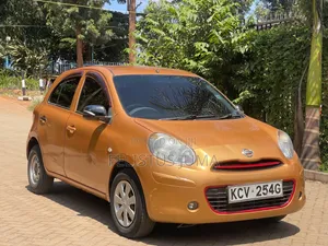 Nissan March 2009 Rangi ya Chungwa
