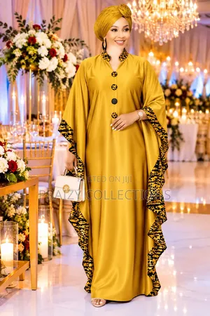 Mavazi ya Kaftan Ubora Mzuri Free Size Yenye Kifungo na Pande Zilizochapishwa