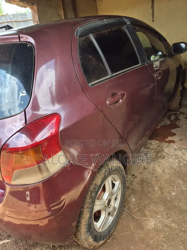 Toyota Vitz 2010 Burgundy - 1