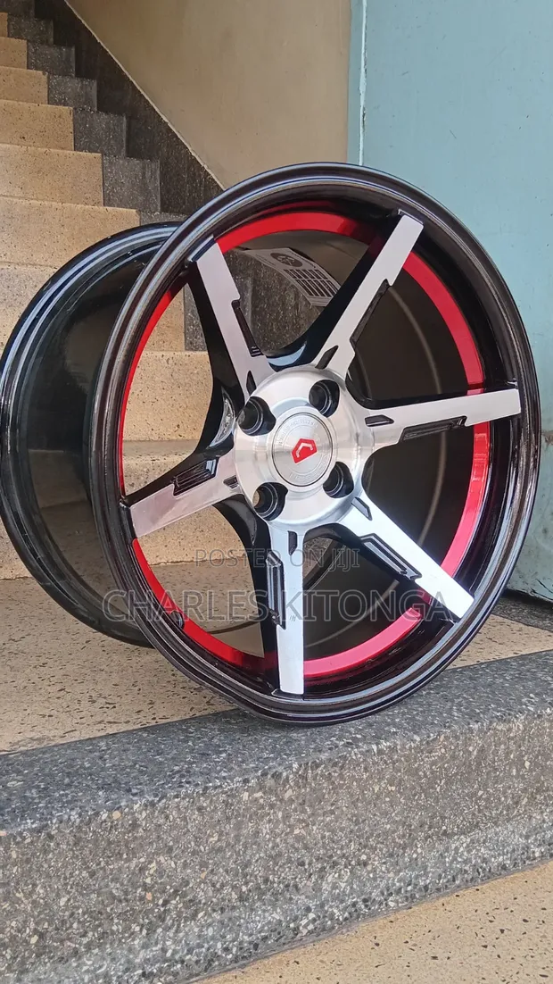 Brand New 15x8.5J 4x100 Rims - 1