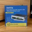 Netis ST106PDI-2-65 4-Port PoE+ Switch - 1