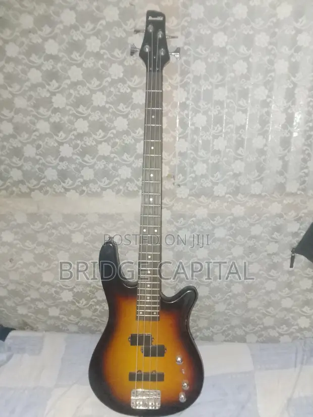 Used Yamaha Acoustic & Ibanez Bass Guitars - 1