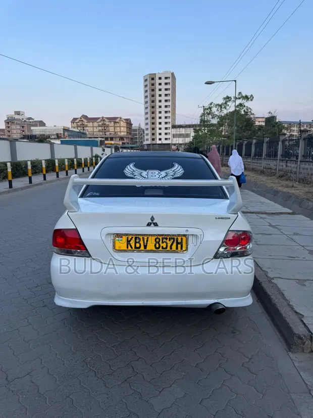 Mitsubishi Lancer 2006 Nyeupe - 1