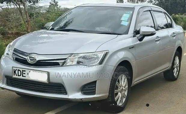 Toyota Axio 2014 Hybrid Silver - 1