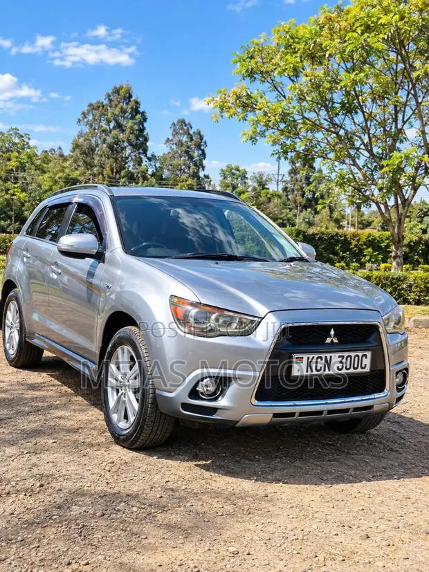 Mitsubishi RVR 2010 Nyeupe - 1