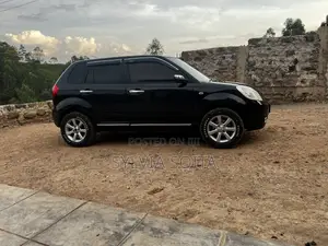 Mazda Verisa 2009 Zambarau