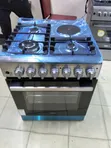 Haier 60x60cm 4-Burner Gas Cooker with Electric Oven - 1