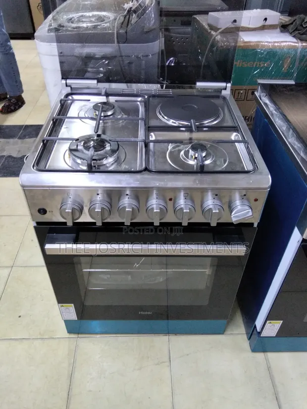 Haier 60x60 Stainless Steel 3+1 Gas Cooker with Gas Sensors & Rotisserie - 1