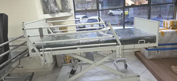 OSKA 4-Function Electric Hospital Bed, Height Adjustable - 1