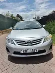 Toyota Corolla 2013 Nyeupe - 1