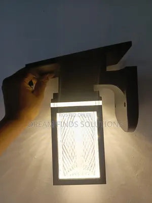 Facet Form Luminary Prism Solar Sconce