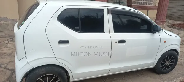 Suzuki Alto 1.0 2012 Nyeupe - 1