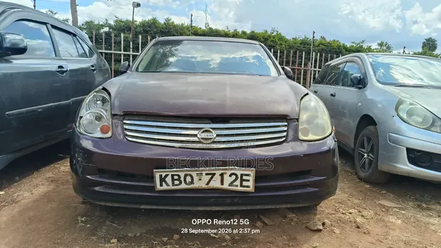 Nissan Skyline 2004 2500cc Maroon - 1