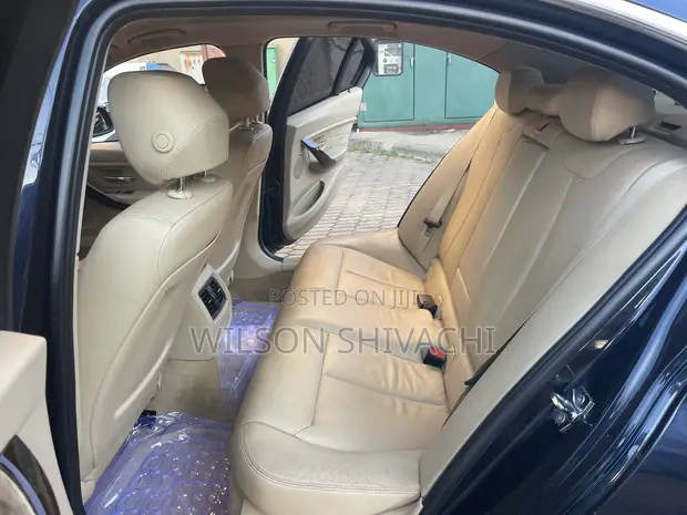 BMW 320i 2013 Bluu - 1