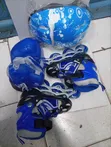 Brand New Blue Roller Skates (Small) with Helmet & Safety Gear - 1