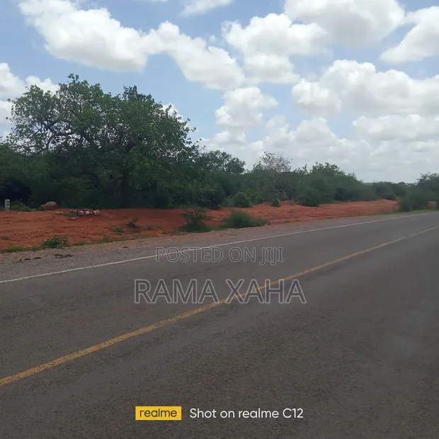 10 Acres Land for Sale in Baolala, Along Tarmac - 1