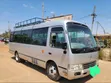 Toyota Coaster 2011 Nyeupe - 1