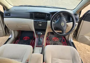 Toyota Corolla RunX 2004 Dhahabu