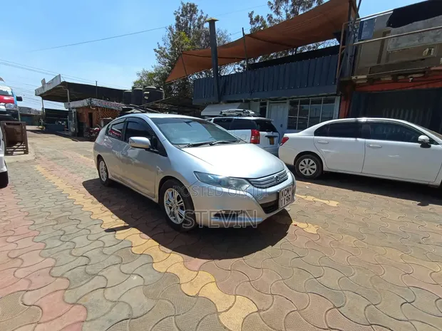 Honda Fit 2010 Silver - 1