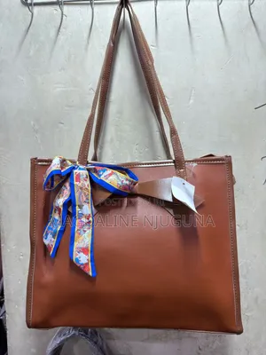 Ladies Genuine Leather Bow Handbag
