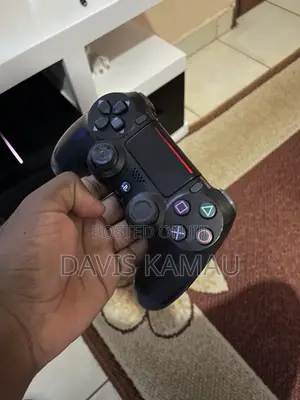 Used Chipped PS4 Console with 2 Controllers & 5 Games