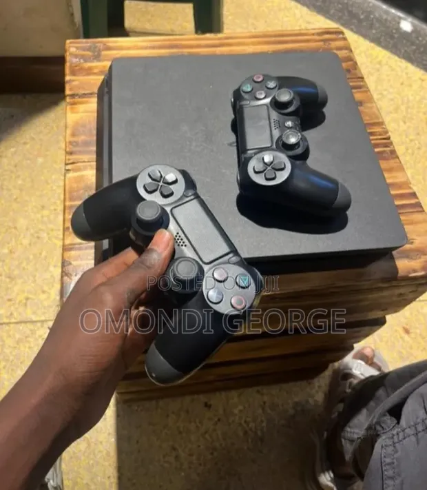 PlayStation 4 Slim - Chipped with 5 Games - 1