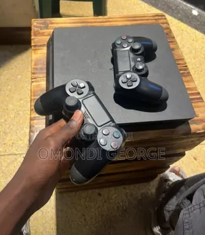 PlayStation 4 Slim - Chipped with 5 Games