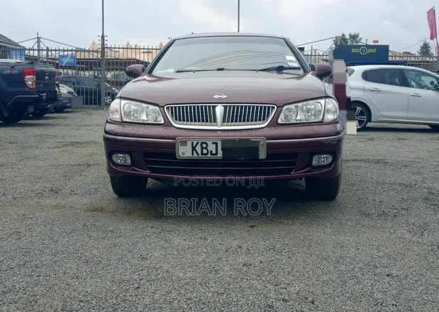 Nissan Bluebird 2002 Maroon - 1