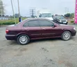 Nissan Bluebird 2002 Maroon - 4