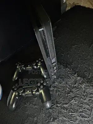 PlayStation 4 Slim with 2 Controllers