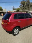 Mazda Verisa 2009 Maroon - 3