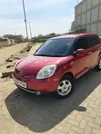 Mazda Verisa 2009 Maroon - 5