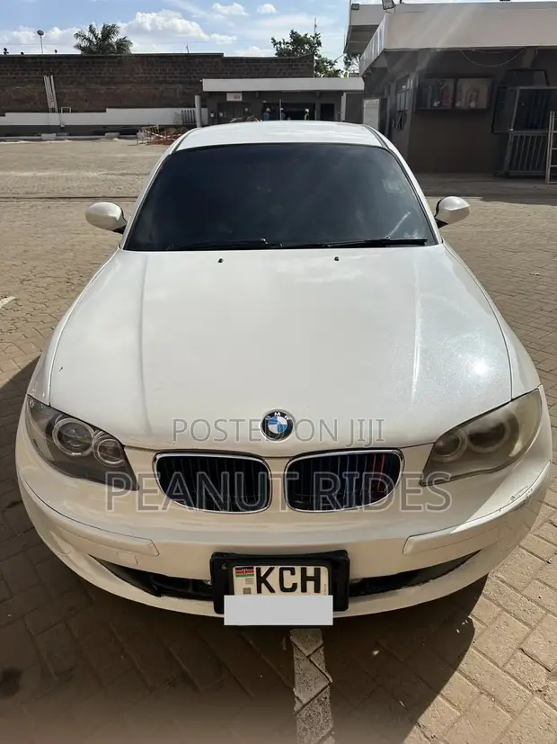 BMW 116i 2009 White Hatchback - 1