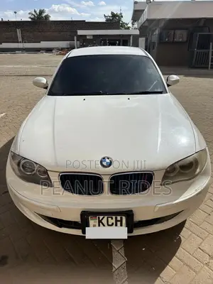 BMW 116i 2009 Nyeupe Hatchback